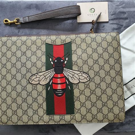 gucci bee clutch|Gucci bee collection.